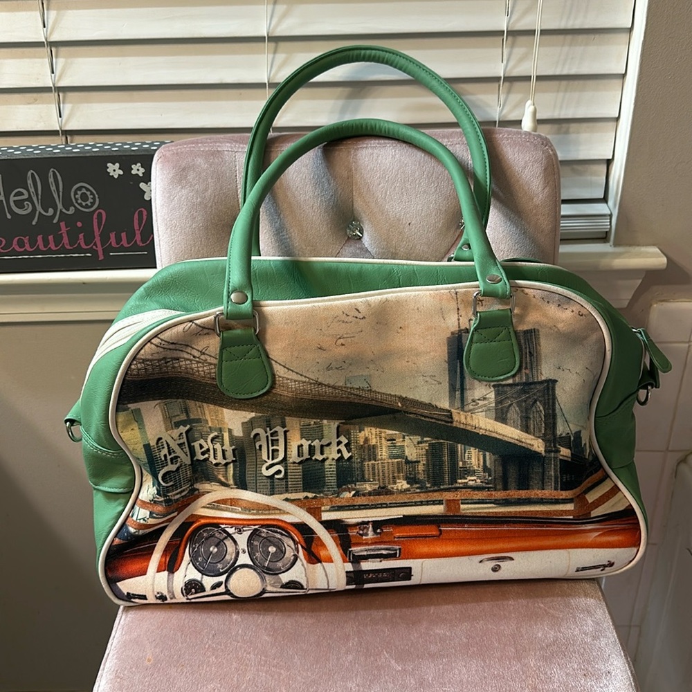 Large bowler bag. Like new! Strap to elongate and wear crossbody included.